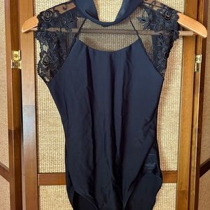 Two black leotards (L), two pair Capeziox dance shoes, black (10M) pink (10.5M)